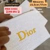 Trousse Dior blanche effet tressé avec logo doré